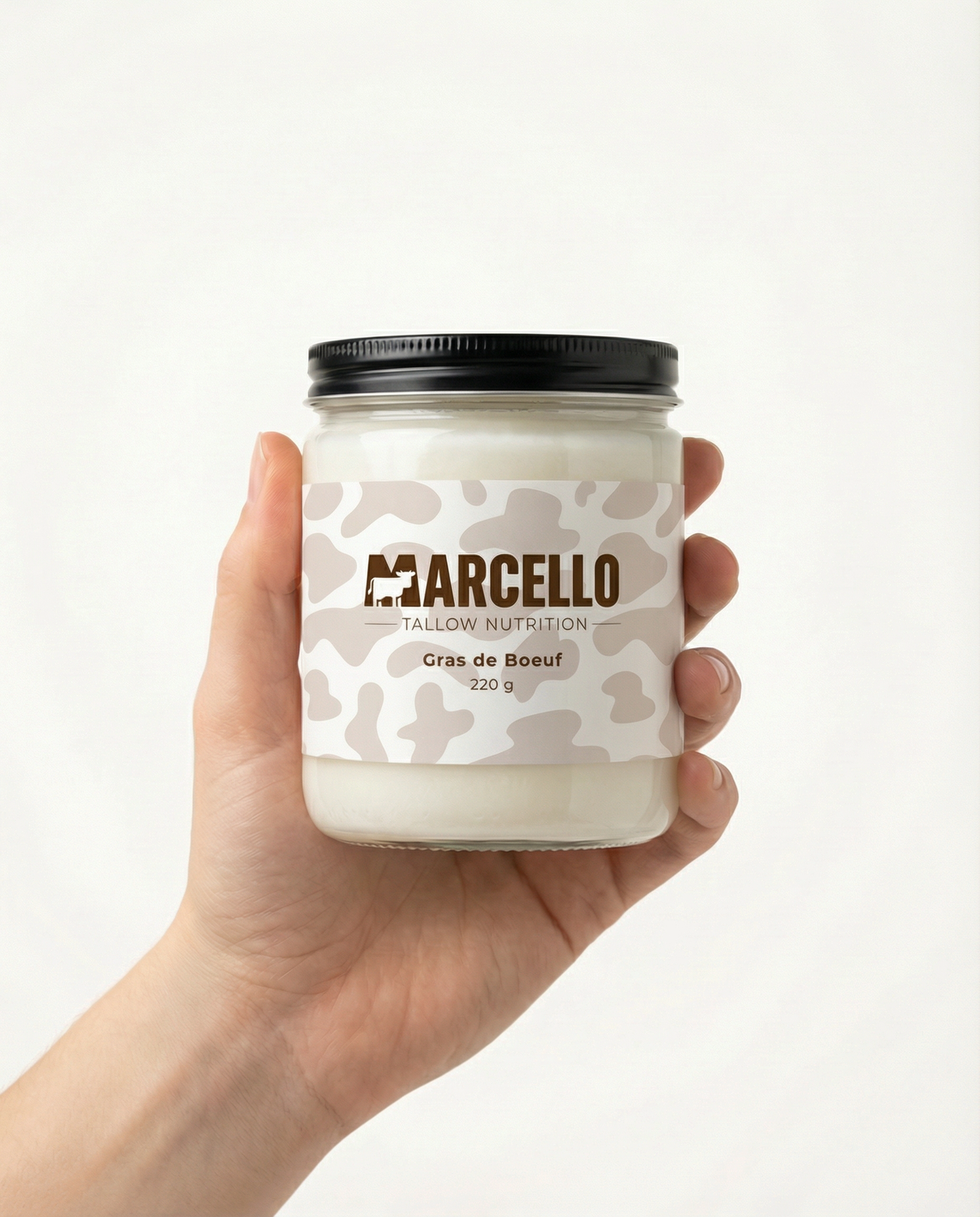 Suif de bœuf alimentaire de pâturage — tallow culinaire artisanal 220g — MARCELLO tenu à la main shooting fond blanc tallow boeuf suif